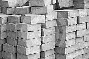 Silicate grey paving bricks in stacks