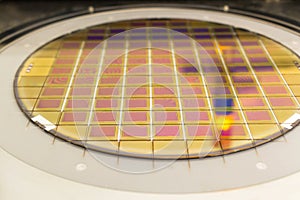 Silicon wafer with microchips fixed in the holder is on the chuck and ready for process cleaning photo