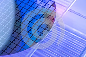 Silicon Wafer with microchips used in electronics photo