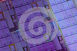 Silicon wafer with microchips used in electronics for the fabrication of integrated circuits. Full-frame high-tech macro