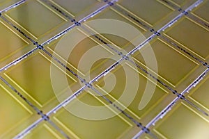 Silicon Wafer with microchips - A wafer is a thin slice of semiconductor material, such as a crystalline silicon, used