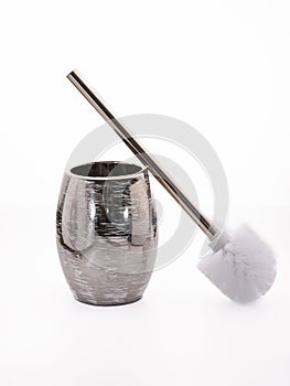 Silicone toilet brush with ceramic holder isolated over white background with clipping path included