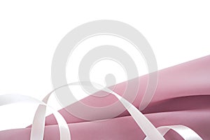 Silk beige folded fabric with tender-pink ribbon background. Use for banner design for fabric stores, tailoring shops and stores o