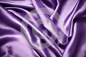 Silk fabric background. Purple shiny silk fabric texture. High resolution.