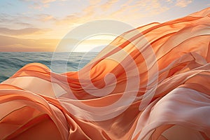 Silk fabric develops in the wind against the background of the sea and sky