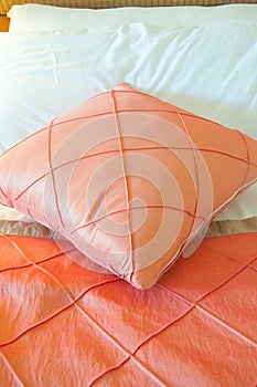 Silk pillow on bed