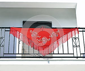 Silk shawl  on the balcony photo