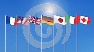 Silk waving G7 flags of countries of Group of Seven Canada, Germany, Italy, France, Japan, USA states, United Kingdom. Blue sky
