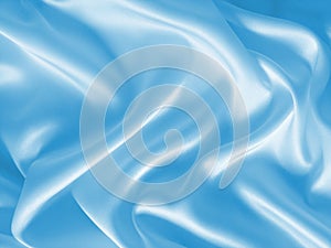 Draped light blue silk background