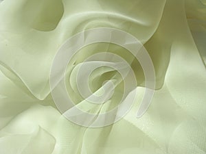 Silky crem-colored material