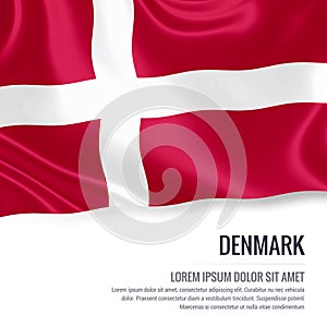 Silky flag of Denmark waving on an isolated white background with the white text area for your advert message. photo