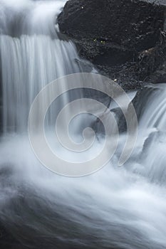 Silky, turbulent water of a small waterfall in Hebron, Connecticut