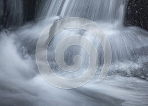 Silky, turbulent water of a small waterfall in Hebron, Connecticut