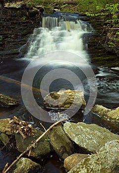 Silky water of Day Pond Falls in Colchester, Connecticut