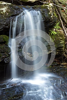 Silky water of Day Pond Falls in Colchester, Connecticut