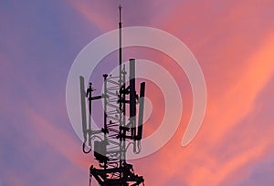 Sillhouette of Telecommunication tower in vivid sky color
