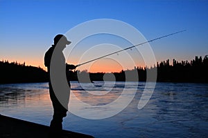 Sillouette fisherman