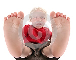 Silly Baby Boy Lying on His Back Laughing