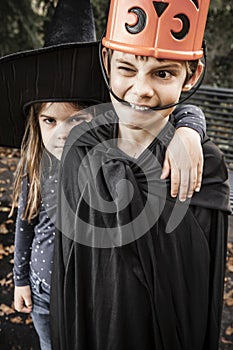 Silly brother and sister getting ready for Halloween