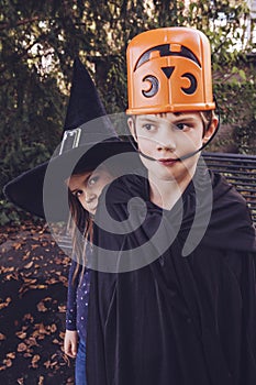 Silly brother and sister getting ready for Halloween