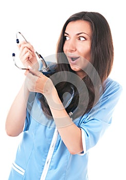 Silly looking amazed woman with phonendoscope