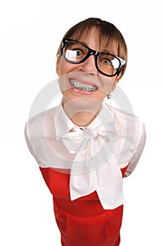 Silly woman with braces. Woman dressed in the red suite. White background