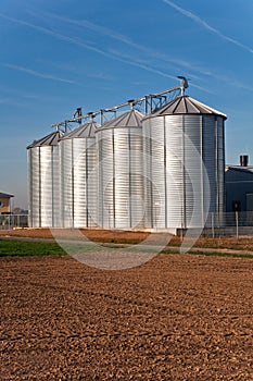 Silo in beautiful landscape in sun