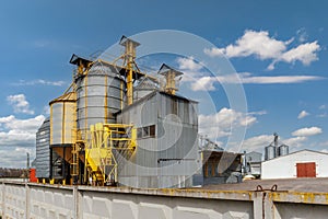 silos on agro-industrial complex with seed cleaning and drying line for grain storage