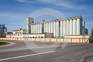 silos granary elevator on agro-industrial complex with seed cleaning and drying line for grain storage photo