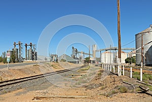 Silos, hoppers, elevators and bunkers at a grain storage facility