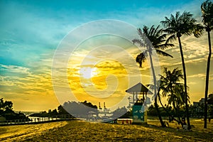 Siloso Beach during sunset at Sentosa Island, Singapore.