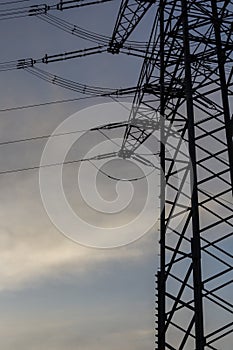 Silouette of a power pole in the blue twilight