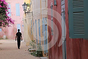 Silouhette in a small street of Goree in Senegal