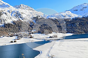 Silvaplana lake in winter from high view to Piz Corvatsch photo