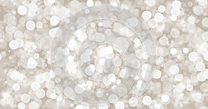 Silver abstract bokeh and snow falling winter Christmas holiday background.