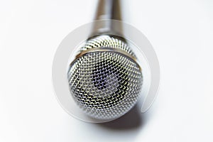 Silver audio microphone on white background