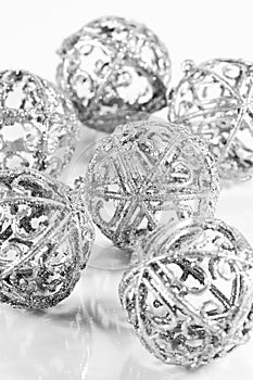 Silver balls on white background