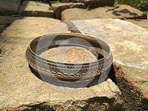 Silver bangle with unique pattern and lines