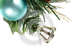 Silver bell, blue bauble on Christmas tree