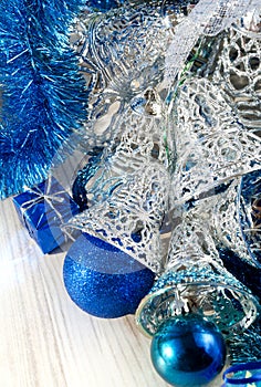 Silver bells and blue Christmas tree decorations. Decorations for the New Year and Christmas