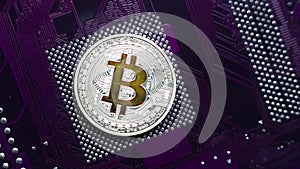 silver bitcoin close-up on a purple microchip background.