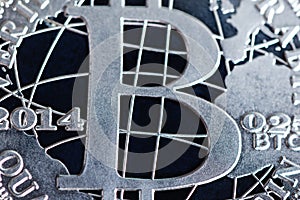 Silver bitcoin coin close up