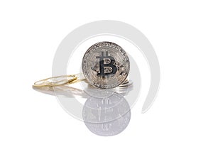 Silver bitcoin isolated on white background, close up