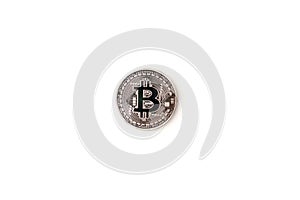 Silver bitcoin with light effected isolated on white background