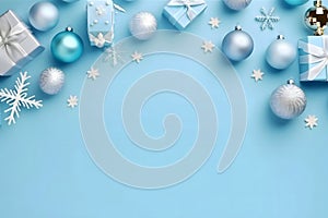 Silver and blue baubles and snowflakes, gifts with bows on blue background. Top view.Christmas bright background, banner with