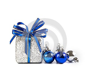 Silver and blue Christmas balls and gifts on white background