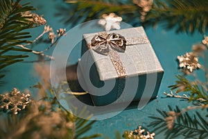 Silver and blue Christmas present box with ribbon