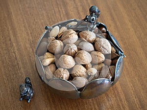 Silver Bowl with Mixed Nuts in the Shell