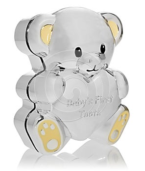 Silver box in the shape of a teddy bear to the first baby teeth.