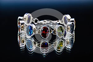 Silver bracelet with color jems Jewelry isolated photo